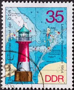 GERMANY, DDR - CIRCA 1975 : a postage stamp from Germany, GDR showing the lighthouse Peenemünde on the Baltic Sea (built 1954) lighthouses, beacons, beacons and pier lights of the GDR