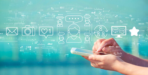 Social media theme with person holding a white smartphone
