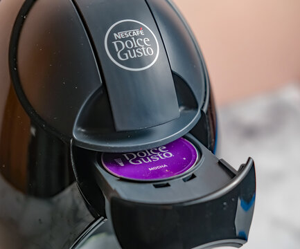 Norwich, Norfolk, UK – November 20 2020. An illustrative photo of a Dolce Gusto mocha capsule in a Dolce Gusto coffee machine