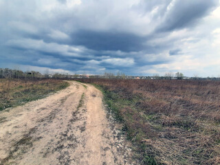 Fototapeta na wymiar dirt road in the field