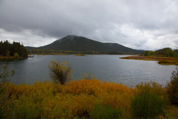 Autumn colors with a river in the  foreground