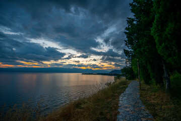 Sunset over Lake Ohrid with scattered clouds