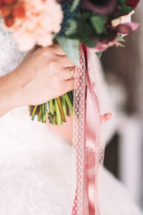 Luxurious expensive ring on the bride's finger