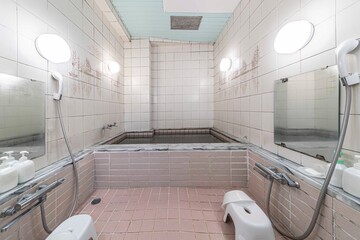 Shower and bathtub in old Japanese style bath