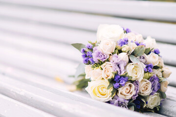 Beautiful delicate wedding bridal bouquet of burgundy, pink and white color close up