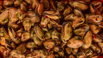 frozen mussels, in oil and marinade. Textures from delicious seafood