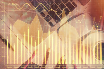 Double exposure of financial chart drawing over table background with computer. Concept of research and analysis. Top view.