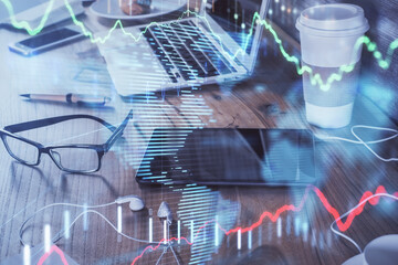Double exposure of forex chart drawing and cell phone background. Concept of financial trading