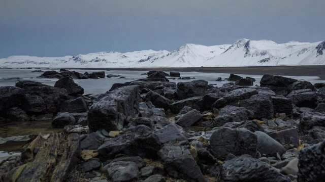Coast in Iceland, windy weather, Stones in front, moving Timelapse with Cold Weather
