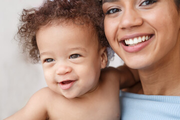 Love of a mother and baby. Son and mom. Family in the house. Lifestyle