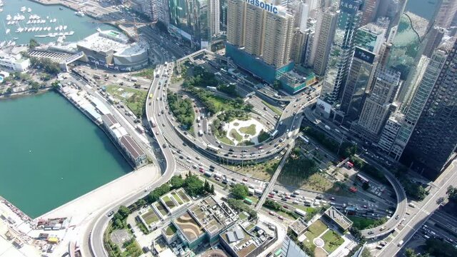 Traffic heading in and out of Cross Harbour Tunnel, Causeway Bay, Downtown Hong Kong, Aerial view.