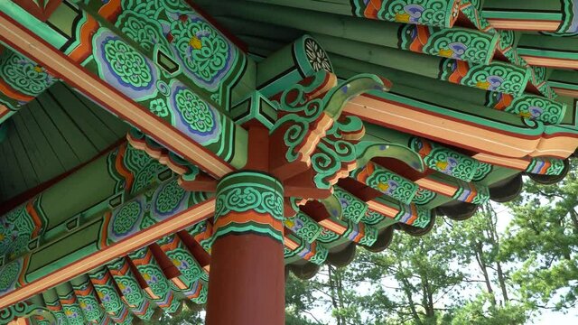 Colorful Painted Roof Of A Shrine In Tomb Of Seven Hundred Patriots In Geumsan, South Korea. - low angle shot