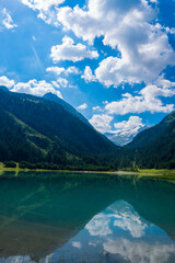 Naklejka na ściany i meble Durlassboden reservoir in the Zillertal Alps, mountain lake with reflection in austria