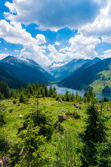 Fototapeta na wymiar Durlassboden reservoir in the Zillertal Alps, mountain lake with reflection in austria
