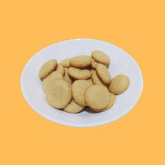 White bowl of homemade vanilla cookies