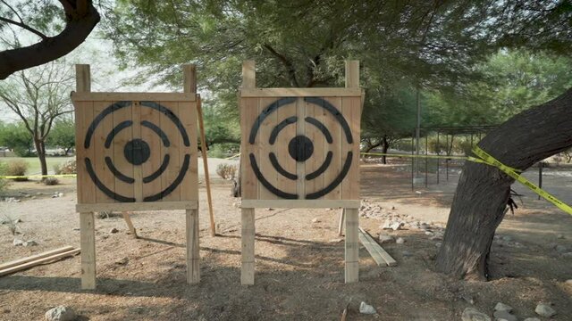 Missed Axe Throw at Target Practice Event for Competition in Slow motion for Boy Scouts