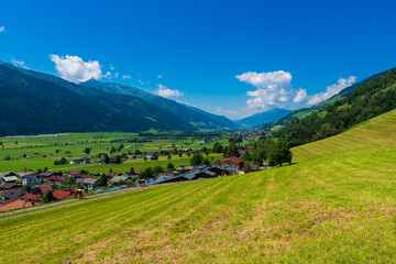 Summer time countryside panoramic landscape in Austria near Mittersill village