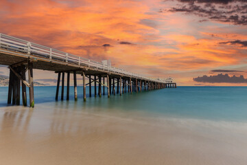 Malibu Pier beach with sunset sky near Los Angeles in California.  