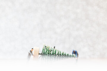 Miniature people : Worker team prepare christmas tree , Christmas decoration concept
