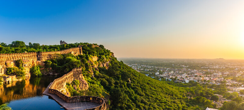 View during sunset from Chittor or Chittorgarh Fort with city in backdrop. It is one of the largest forts in India &  listed in the UNESCO World Heritage Sites list as Hill Forts of Rajasthan.