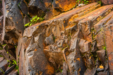 Strata of foliated homogeneous metamorphic rock derived from sedimentary rock.They  form from...
