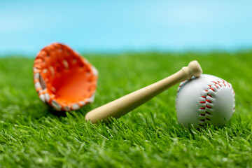 Baseball is on green grass