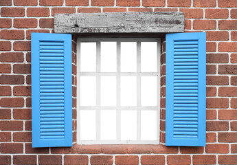 wooden window on brick wall