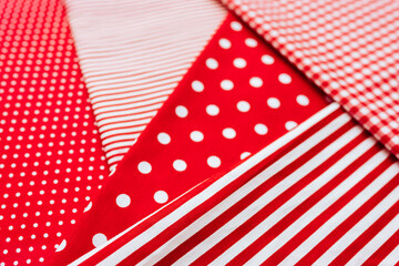 Background from a natural fabric in a red and white colors. Lay flat
