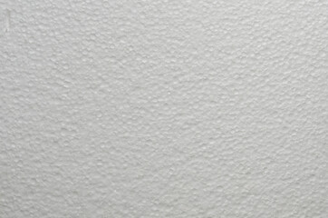 The texture of a sheet of foam used for packaging fragile items during transportation.