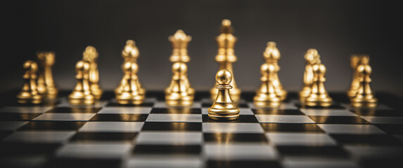 The golden chess team standing on chess board concepts of leadership and business strategy and organization management.