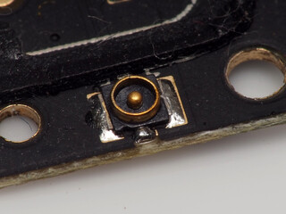 Macro shoot of small antenna (ANT) port on an electronic board