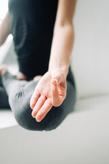 Hand in mudra position. Yoga practice detail