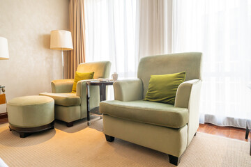 Sofa in front of bedroom window