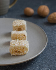 Turkish Delight, Lokum, with nuts on gray background