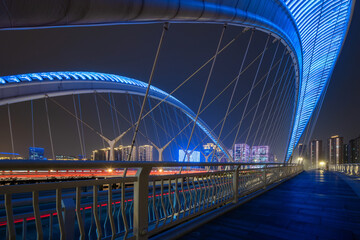 Obraz premium Car light and shadow tracks on bridges and highways at night, Taiyuan, Shanxi Province, China