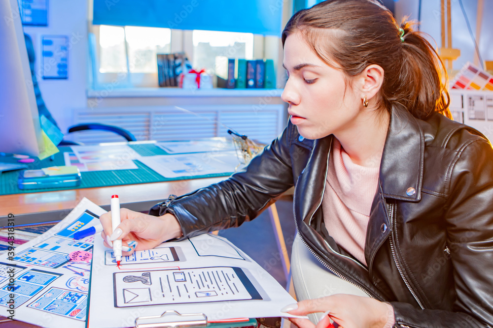 Poster the girl in the leather jacket works as a mobile app designer. development of the user interface of 