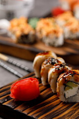Still life with appetizing rolls. Japanese food concept. Close-up.