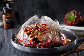 Delicious Chinese food, roast beef wrapped in paper