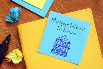 Financial concept about Mortgage Interest Deduction with sign on the page.