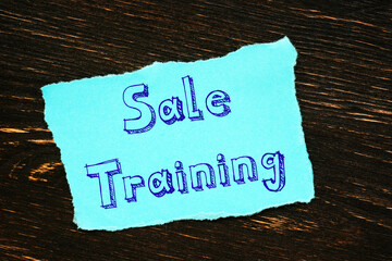 Sale Training sign on the piece of paper.