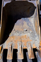 Closeup of a excavator scraper bucket. Closeup of a scraper pan. Closeup of a scraper bowl.