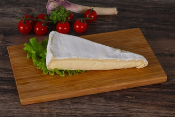 Brie cheese triangle served salad