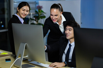 Business team working overtime late at night in call center office. Concept for business at night.