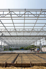 wire mesh steel. Pulins on rafter and roof beem truss frame.