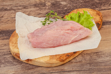 Raw turkey breast steak for cooking