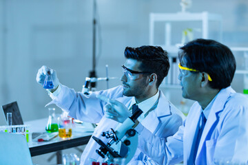 Team of research scientists analysing test trial new generation vaccine data.