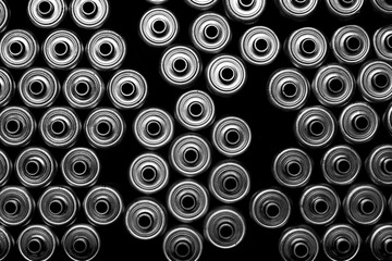 Black and white image of 
conveyor wheels, o-ring driven rollers and pulleys.