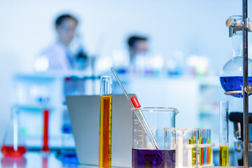 Laboratory Research - Scientific glassware with blur background.