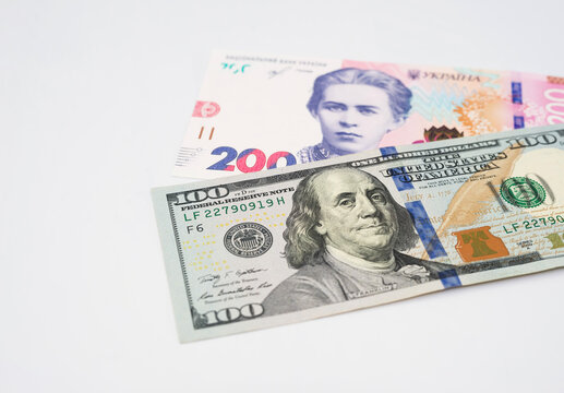 Ukrainian money - hryvnia banknotes USA dollars bills. Finance in Ukraine, of the hryvnia to the dollar exchange rate.