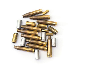 empty cases for carbine and rifle isolated on white background. Shooting ammunition, close-up.